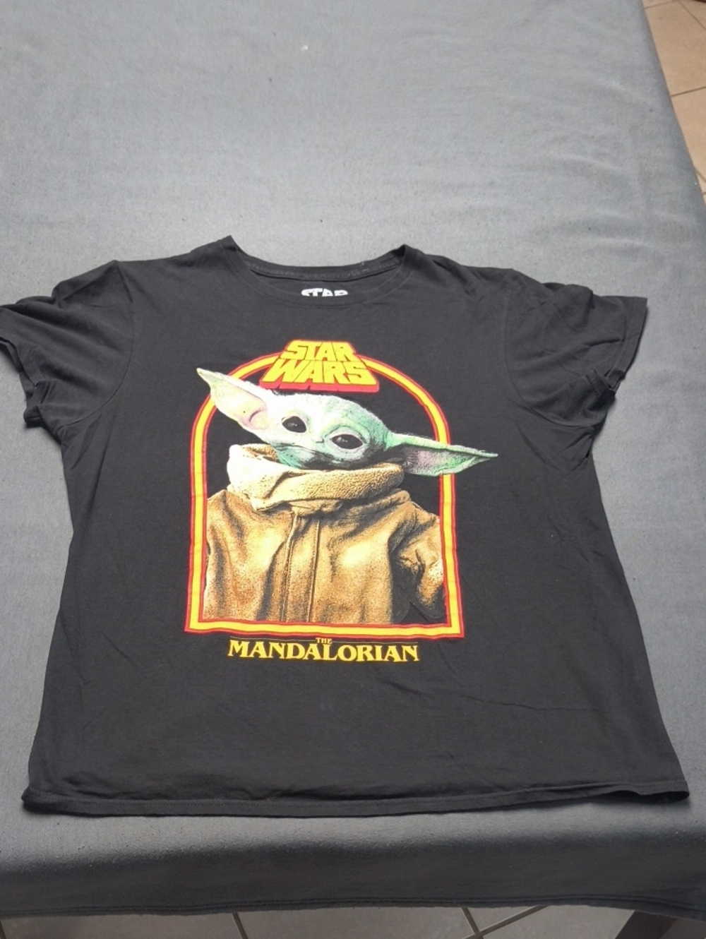 Star Wars Black Kids Tee with Grogu Graphic and Yellow-Orange Accents Size Mediu